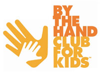 by the hand